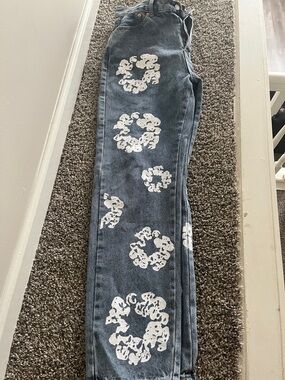 Blue denim tear jeans